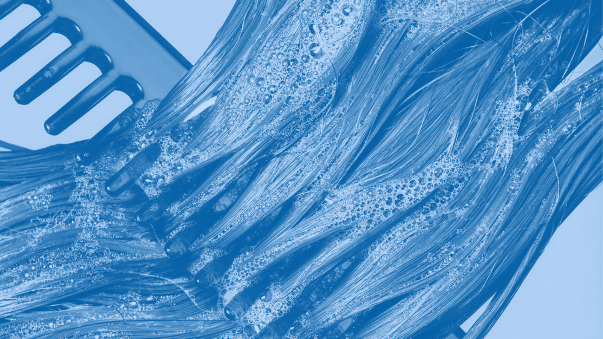 Comb in wet hair preventing mechanical damage and fallout